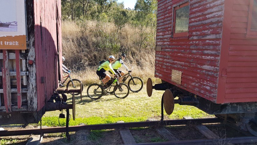 BVRT Blackbutt to Linville - cyclists between the old carriages