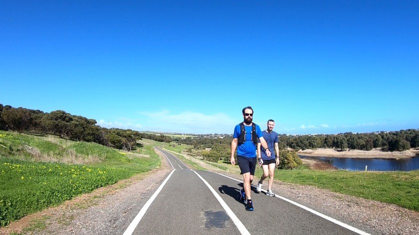 Coast to Vines Rail Trail - walkers in the foreground with the Onkaparinga wetlands to the right